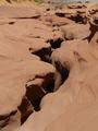 Der Eingang in den Antelope Canyondann ist eine �berraschung: Eine schmale Spalte im Felsboden sollte der Eingang sein? Das sah aus wie der Eingang in die Unterwelt. 